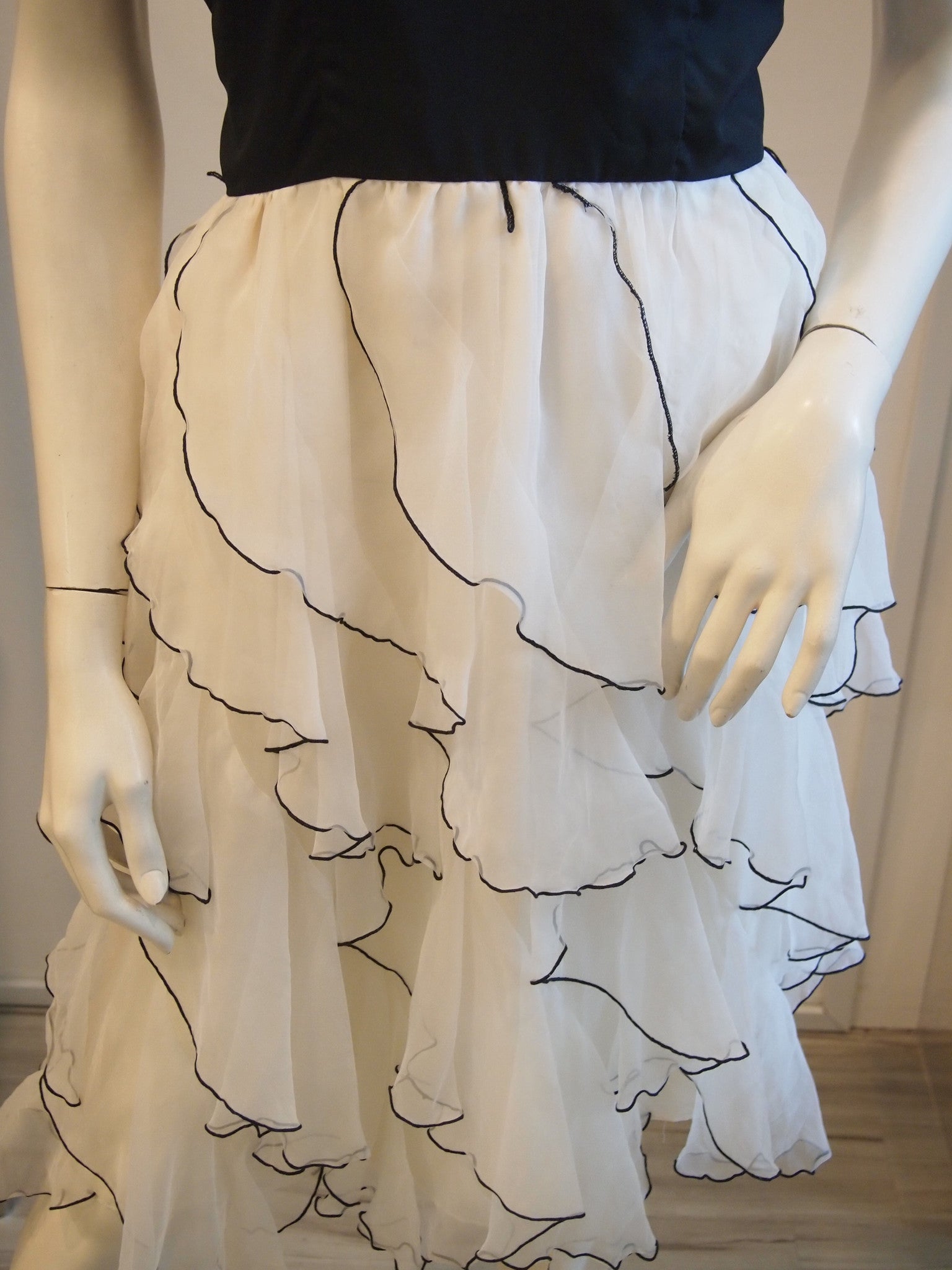 Black with white ruffles and black trimming skirt
