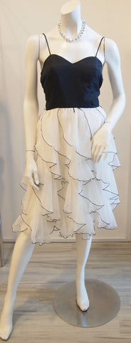Black with white ruffles and black trimming skirt