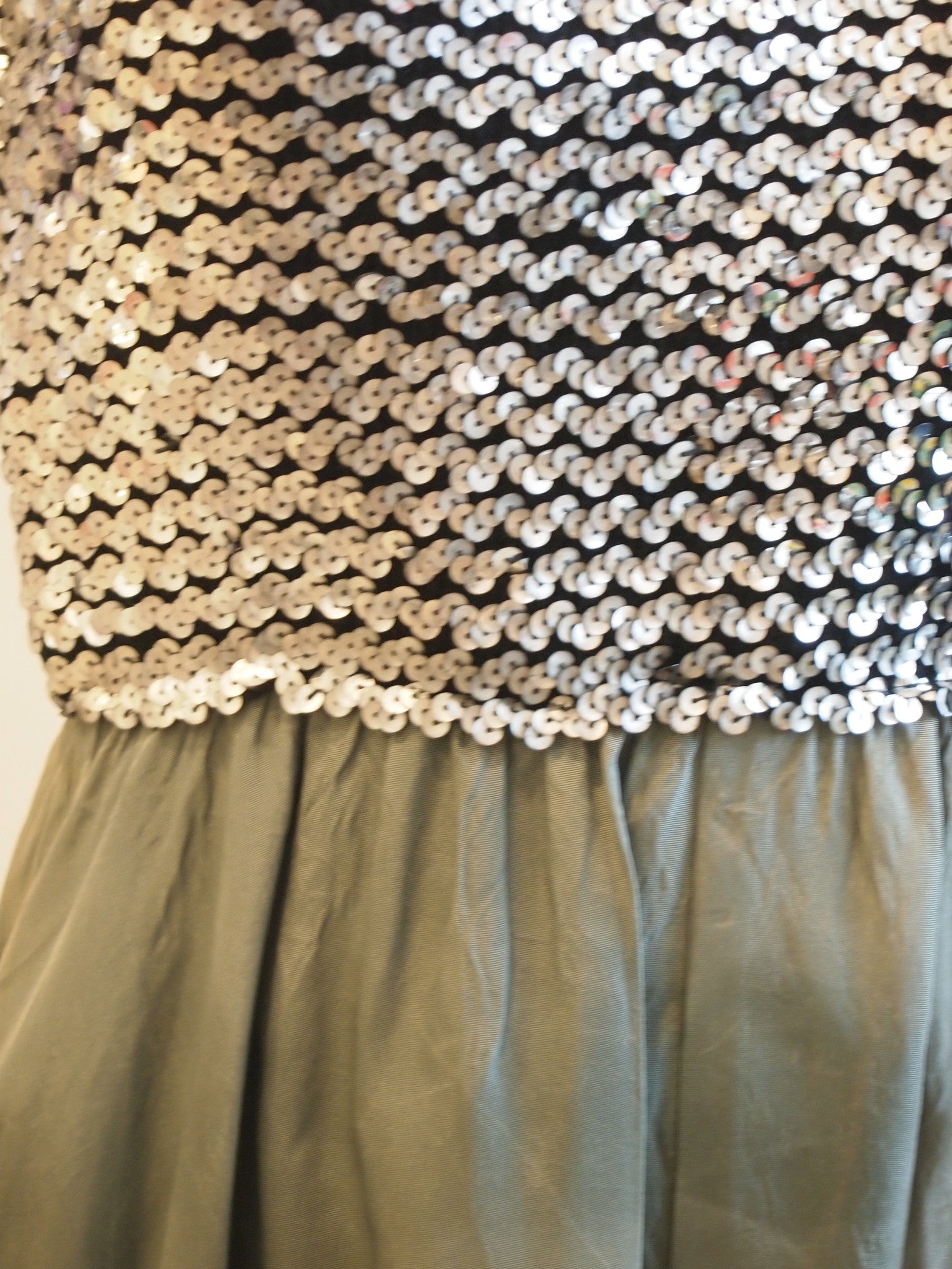 Silver sequin top and grey skirt