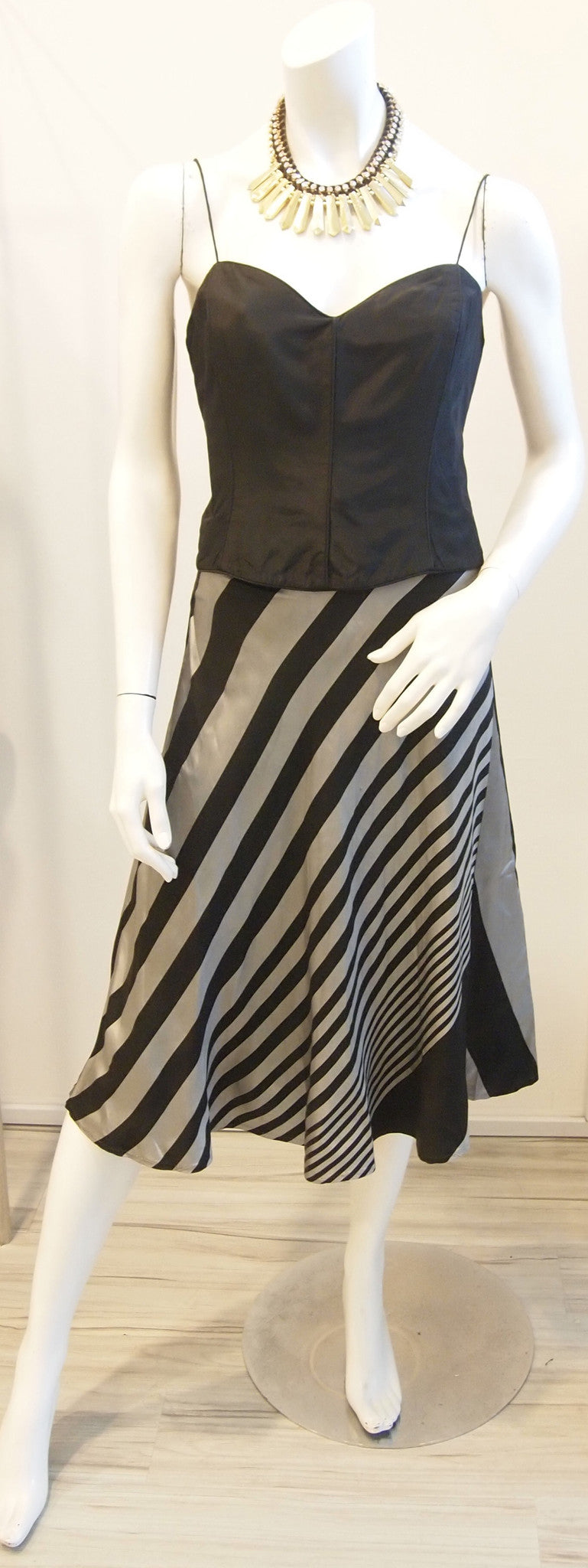 Black bustier with silver black diagonal stripe skirt