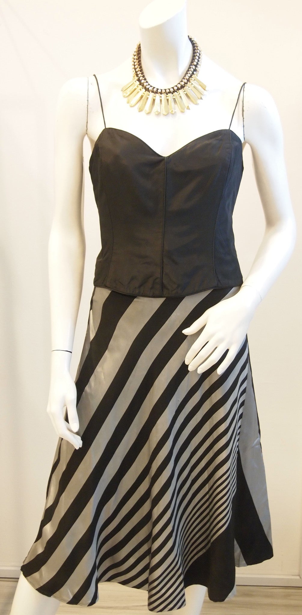 Black bustier with silver black diagonal stripe skirt